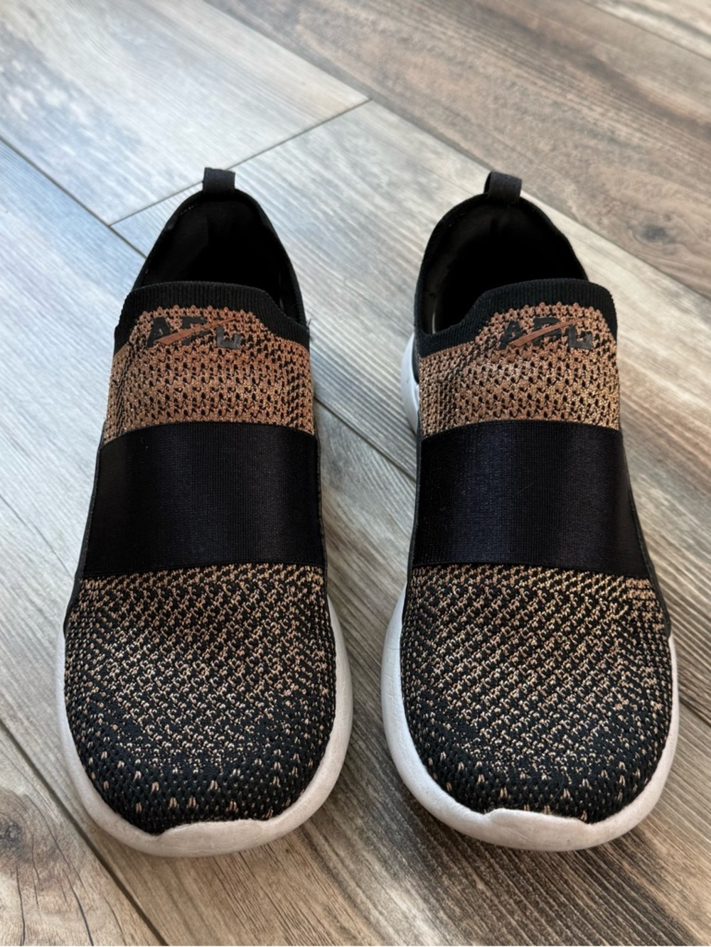 APL Women’s Slip-On Knit Sneakers in Black and Rose Gold